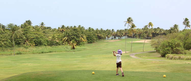 Girl hitting Golf Shot Puerto Rico Picture
